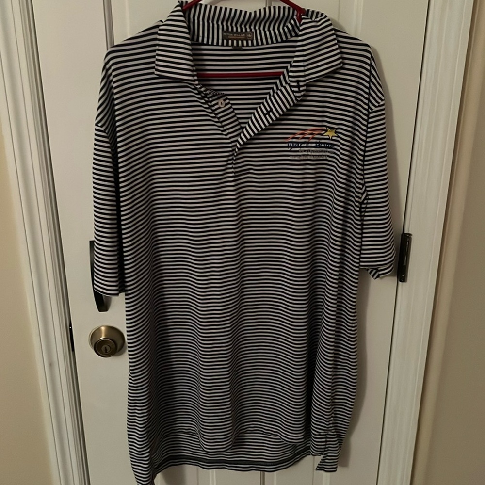 Striped golfing polo. Drift material. Barely worn. No stains. Great condition.